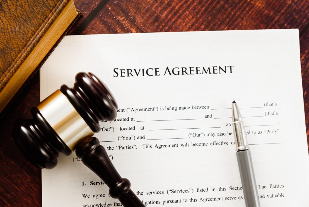 Concept Image of a Service agreement written by a lawyer.